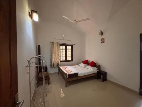 Postel nebo postele na pokoji v ubytování Casa Grande Homestay Anaviratty Munnar