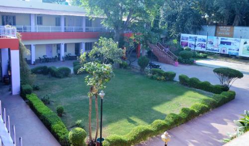 an aerial view of a garden in front of a building at Hotel Goverdhan Tourist Complex in Fatehpur Sīkri
