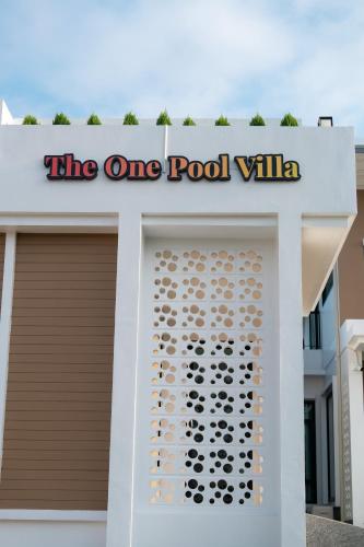 a building with the one pool villa sign at The One Pool Villa เขาใหญ่ in Ban Tha Maprang