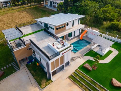 an overhead view of a house with a swimming pool at The One Pool Villa เขาใหญ่ in Ban Tha Maprang