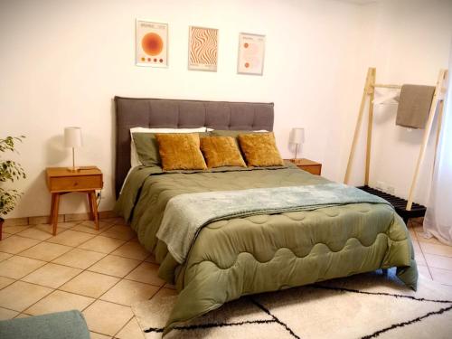 Cama o camas de una habitación en Rosy Suite Bed and Breakfast