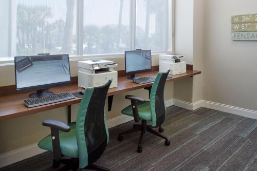 Телевизор и/или развлекательный центр в SpringHill Suites by Marriott Pensacola Beach
