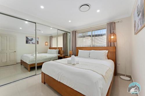Ένα ή περισσότερα κρεβάτια σε δωμάτιο στο Comfortable 4-Bed House in Fairfield with Parking