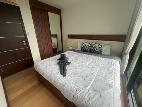 Letto o letti in una camera di The Astra Luxury Condo in Town