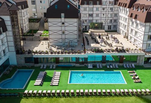 Bazén v ubytování Kraljevi Cardaci, Kopaonik, Lux apartman 9C-71 nebo v jeho okolí