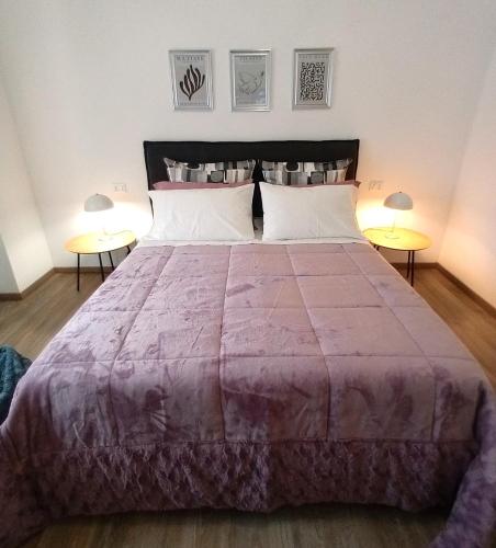 Cama o camas de una habitación en Rosy Suite Bed and Breakfast