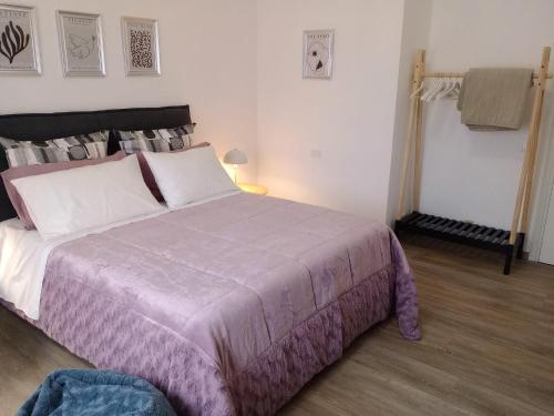 Cama o camas de una habitación en Rosy Suite Bed and Breakfast