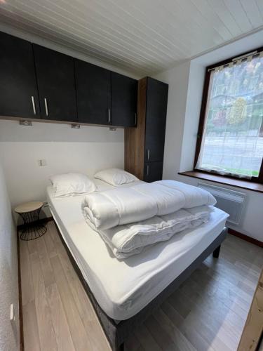 Ένα ή περισσότερα κρεβάτια σε δωμάτιο στο Appartment 4 personnes La Bresse