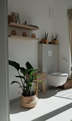 Ένα μπάνιο στο Moderne 3-Zimmer im Grünen