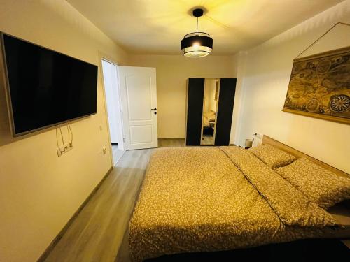 Postel nebo postele na pokoji v ubytování SOFIA Apartment