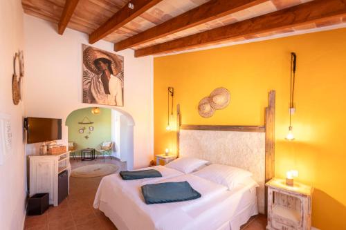 Postel nebo postele na pokoji v ubytování Agroturismo Finca Sa Tanca