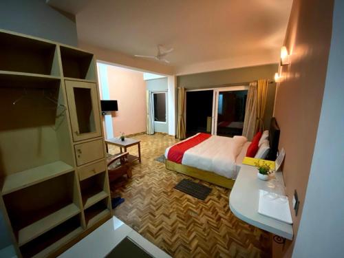 Postel nebo postele na pokoji v ubytování Hidden Gem Residency