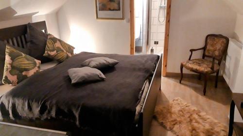 Postel nebo postele na pokoji v ubytování Gesinde Loft