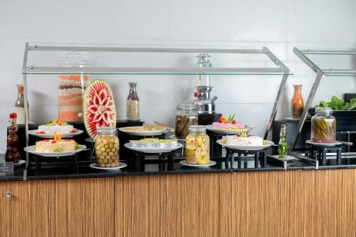 a buffet with many different types of desserts at Elaf Bakkah Hotel in Makkah