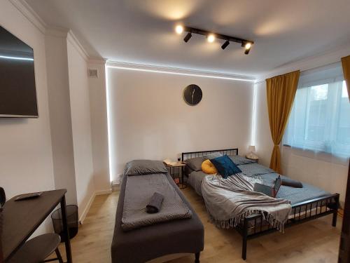 Posteľ alebo postele v izbe v ubytovaní Madera House