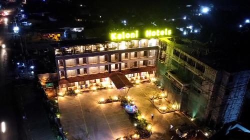 an overhead view of a hotel at night with lights at Kaloni Hotels in Seeta