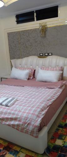 Cama o camas de una habitación en Mon Nid d'Or ABIDJAN CI