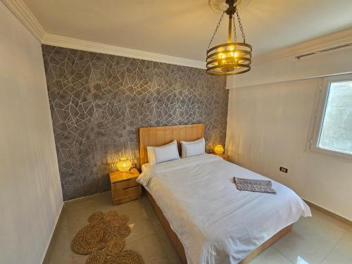 Katil atau katil-katil dalam bilik di Welcome sea view - families only