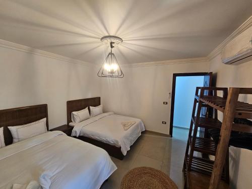 Katil atau katil-katil dalam bilik di Welcome sea view - families only