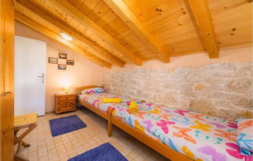 Postel nebo postele na pokoji v ubytování Nice Home In Vizinada With Wifi