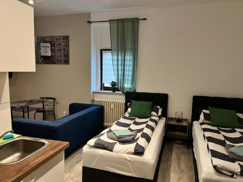 Giường trong phòng chung tại LENASTAY I City Comfort Apartment in Top Location