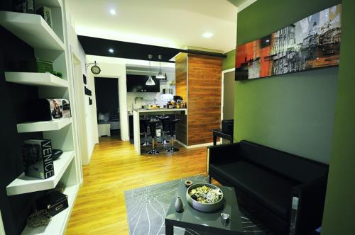 a room with a kitchen and a living room at B&B Destinazione Roma in Rome