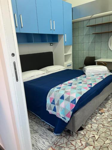 Ένα ή περισσότερα κρεβάτια σε δωμάτιο στο Casetta Lady