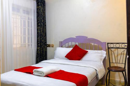 Ένα ή περισσότερα κρεβάτια σε δωμάτιο στο Ludali homes