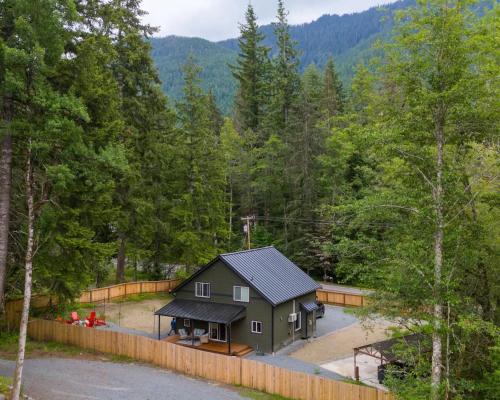 an aerial view of a house in the woods at Forest Haven in Ashford