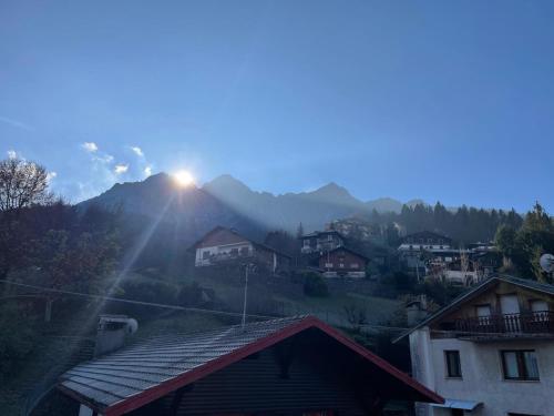 a view of the sun setting on a mountain at Colleoni Apartment di Manenti Andrea in Oltre il Colle