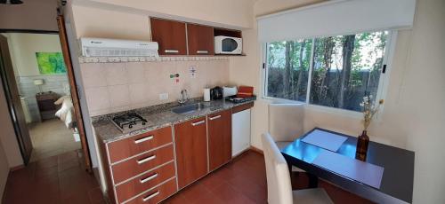 Kuchyň nebo kuchyňský kout v ubytování Terra Apart Hotel