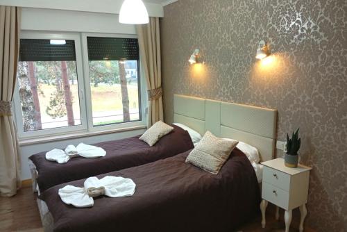 Katil atau katil-katil dalam bilik di forest-house lt