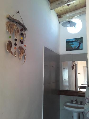 a bathroom with a sink and a mirror at Don Emi in San Rafael