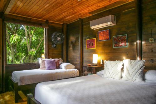 Ένα ή περισσότερα κρεβάτια σε δωμάτιο στο Villa Tayrona