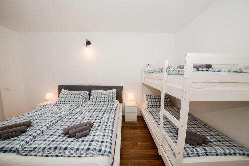 Letto o letti in una camera di Garda Family & Solarium
