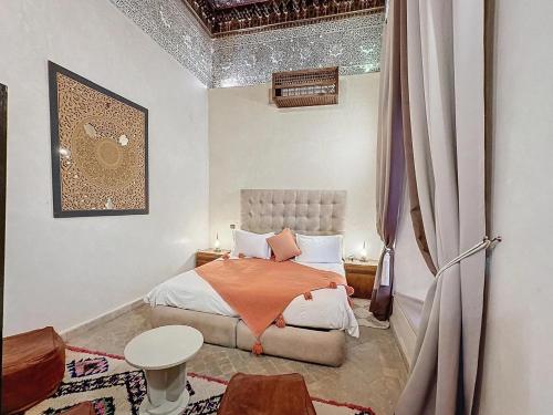 Postel nebo postele na pokoji v ubytování Le Medina Privilège Riad & Spa