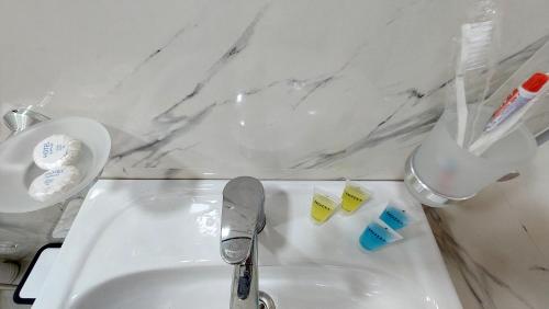 Un baño de Akelvani Guest House