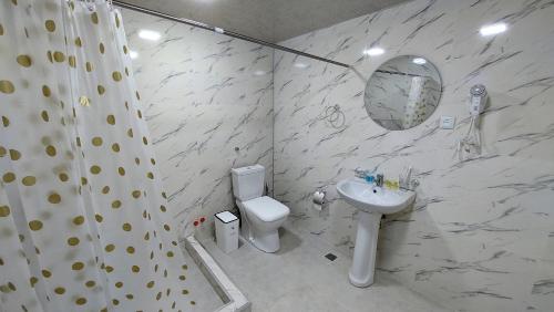 Un baño de Akelvani Guest House