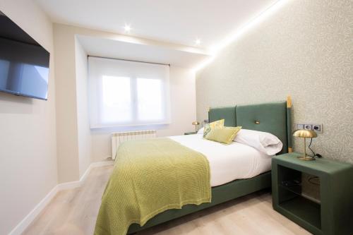 Ένα ή περισσότερα κρεβάτια σε δωμάτιο στο Apartamentos O Devezo