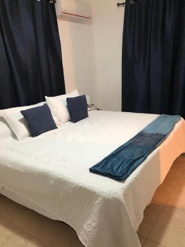 Postel nebo postele na pokoji v ubytování Caribbean Blues
