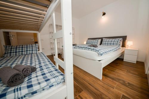 Letto o letti in una camera di Garda Family & Solarium