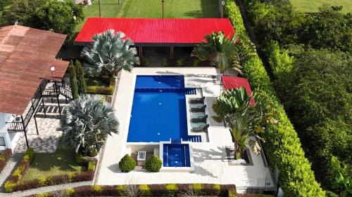 an overhead view of a house with a swimming pool at Finca Casa Blanca in Armenia