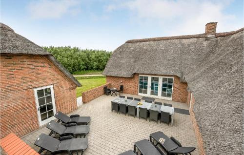 an overhead view of a patio with tables and chairs at 7 Bedroom Gorgeous Home In Ulfborg in Øby