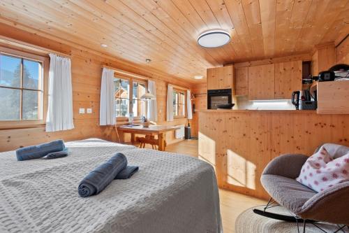 Voodi või voodid majutusasutuse Gemütliches Chalet mit privater Sauna und schöner Aussicht toas