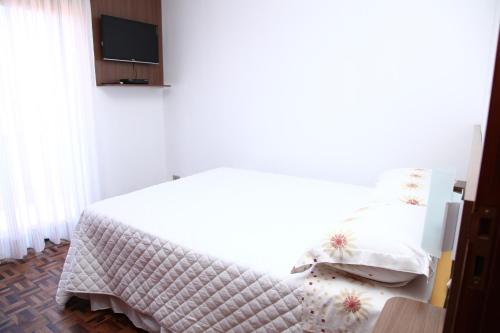 Katil atau katil-katil dalam bilik di Hospedaria Gãstehaus Enzian
