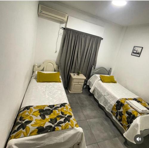 Cama o camas de una habitación en Cómo en casa