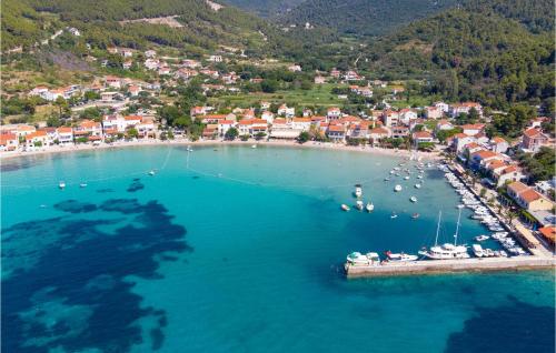 an aerial view of a beach with boats in the water at Holiday Home Zuljana 21 in Žuljana