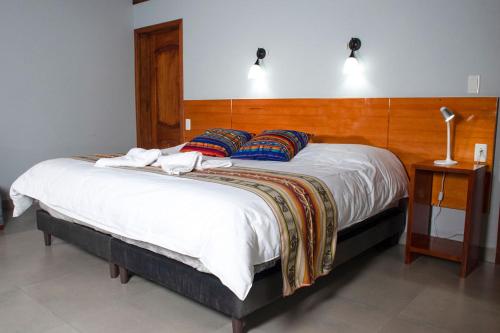 Ein Bett oder Betten in einem Zimmer der Unterkunft Rio Quijos EcoLodge