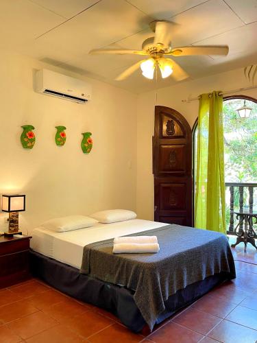 Ένα ή περισσότερα κρεβάτια σε δωμάτιο στο Casita de Playa BOMALU