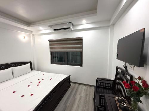 Ένα ή περισσότερα κρεβάτια σε δωμάτιο στο The Queen Hotel & Spa 2